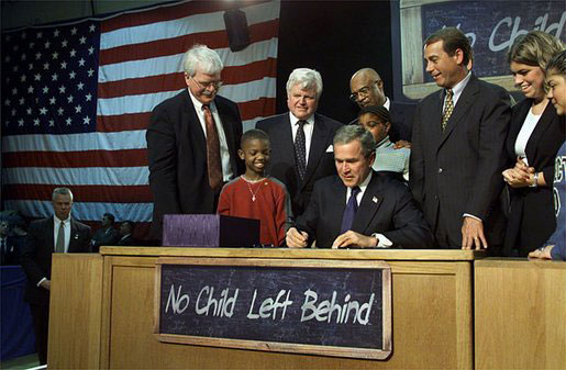President Bush signing the No Child Left Behind Act at Hamilton H.S. in Hamilton, Ohio.